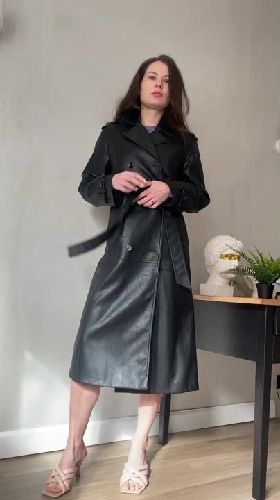Striptease milf in leather coat