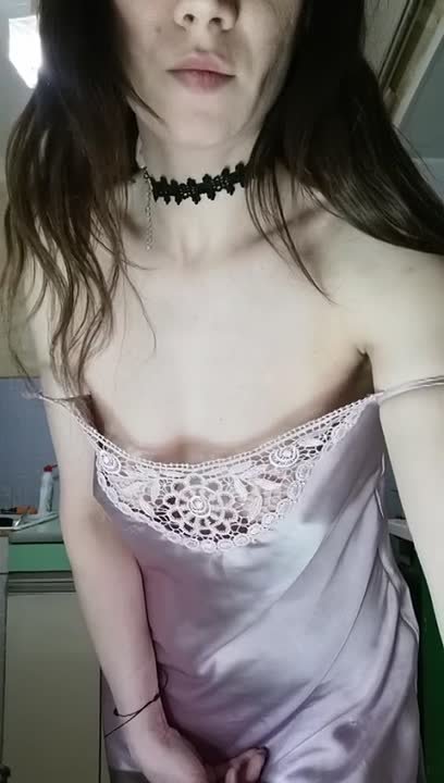 Striptease in the kitchen from a milf